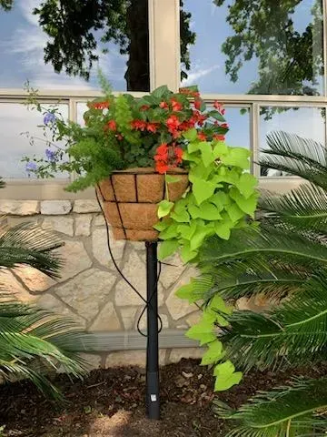 Vertical flower planter cared for by LBJ Gardens at a residential property in Kingsland, Texas near Lake LBJ